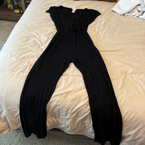 Black v-neck jumpsuit. Size small.